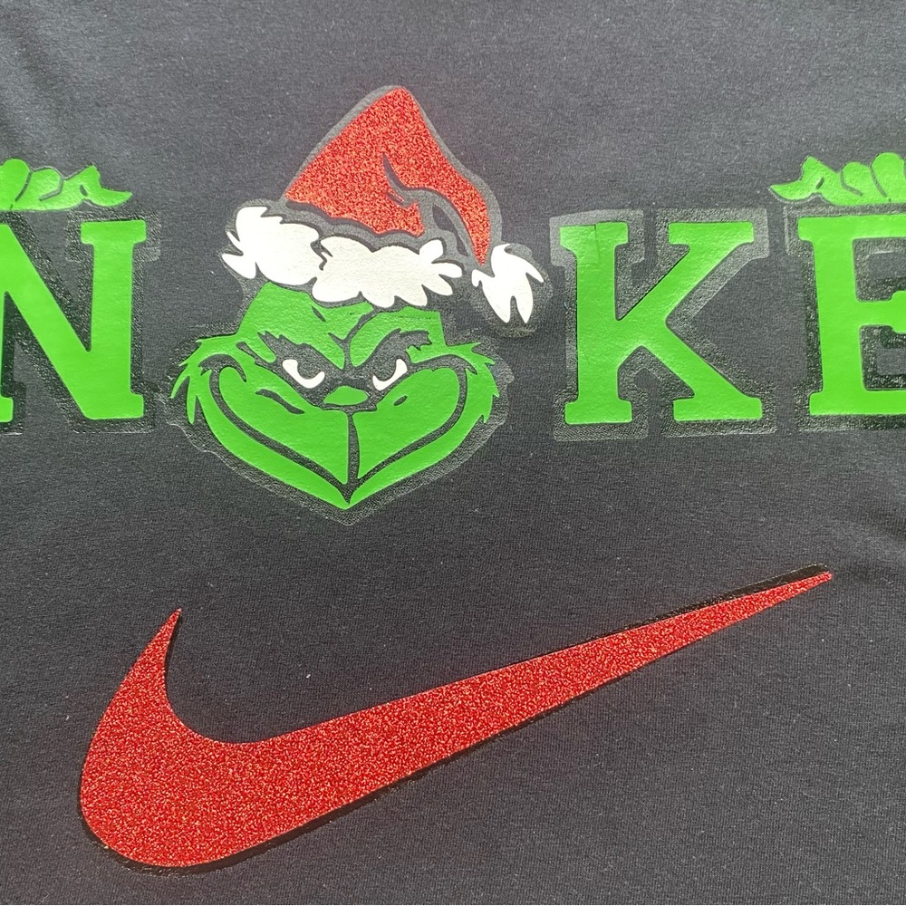 Black Tee with Grinch and Red Swoosh